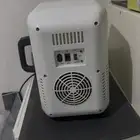 ثلاجه سياره وبيت تعمل بولاعةالسياره وكهرب بيت صغيره