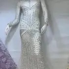 فستان جميل وفخم ولمناسبه كبيره ابيض الموديل في القماش
