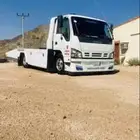 سطحه بالخرج لنقل السيارات