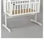 سرير مواليد بني شبه جديد من سنتربوينت