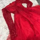 الفستان الهبة الأحمر