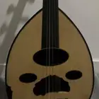 عود عراقي مع شنطته