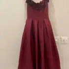 فستان عمرالمحير عنابي