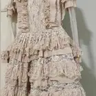 فستان بيبي بنك من ورا الأزرار مفكوكه بس زرين لبسه وحده