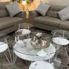 طاولة قهوه مع اربع طاولات خدمه