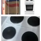 فرن كهربائي جديد بكرتونة