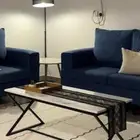 طاولة كبيره مع اربع طاولات خدمة