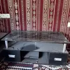 طاولة تلفزيون قزاز اسود