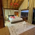 كوخ للايجار بمسبحين داخليه بسخان