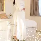 فستان من مصممه كويتيه
