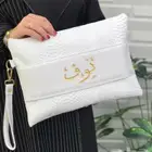 شنطة اليد بالاسم