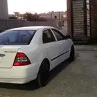 تيوتا كرولا 2003 قير عادي للبيع علي 13000 ماكينة جديد