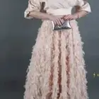 فستان تصميم مصممه أزياء