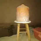 زير فخار مستعمل 5لتر بدون ملاحضات مع الكرسي