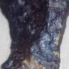 نيزك..Kamacite fragment from a meteorite