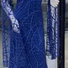 فستان تفصال شك و ترتر اللون ازرق المقاس xl وتقدرين توسعينه