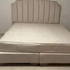 For sale a double bed a washing machine a kitchen oven and a