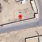 ارض للبيع في الموسم قرية زمزم 25 25 عداد كهرباء