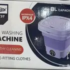 غسالة ملابس صغيره