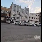 عمارة للبيع اربعة ادوار ومحلين تجارية حي الشرفية