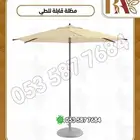 مظلة بقاعدة رخام قابله للطي