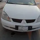 سياره لانسر بومه اوتوماتيك ماشيه 194 الاف قير ماكينه شرط