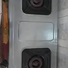 أسطوانة غاز مع المنظم والي والقز