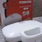 اله تسخين توست جديدة بكرتونها
