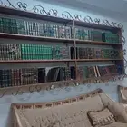 رفوف كتب يعلق في الجدار لتوفير مساحة