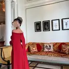 فستان احمر مصممة اماراتية Pansey collection