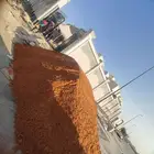 رمل احمر بسعر مغري