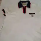 ي جس د تاريخ غوتشي هذا القميص العصري