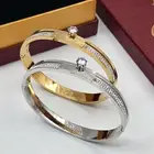 اساور من كارتييه تفاصيل راقية لكل أنثى اسوارة كرتير ذهبي فضي