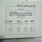 علاقة تلفزيون جدارية ثابته