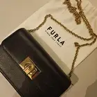 شنطة ماركة furla