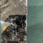 خلفية آيفون Xار مكسورة