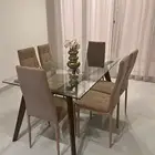 طاولة طعام بشكلين وعدد 6 كراسي