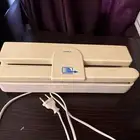 جهاز لاصق حراري