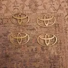 علامة تويوتا ذهبي كامري 98 - 2002