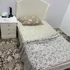سرير نفر مع كمودينه