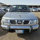 داتسون نيسان 2003 غمارتين اللون فضي