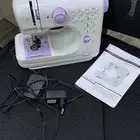 مكينة خياطة. مكينتين خياطة صغيرة و كبيرة