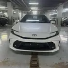 تويوتا كامرى ال اى هايبرد سعودى 2025 ابيض