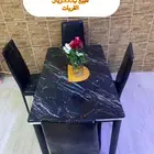 طاولة اكل زجاج ب4كراسي