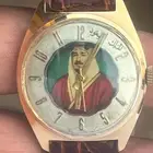 ساعة عليها صورة الملك سعود رحمة الله