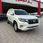 تويوتا برادو نص فل TXL V6 ابيض ممشى 112 الف بنزين 2020