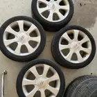 كفرات مع الجنوط النترا للبيع بحاله ممتازه