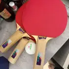 Table tennis table with rackets