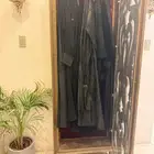 دولاب عبايات خشب معلق بالجدار