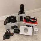 كاميرا كانون 800D عدسة كانون 100mm فلاش كانون